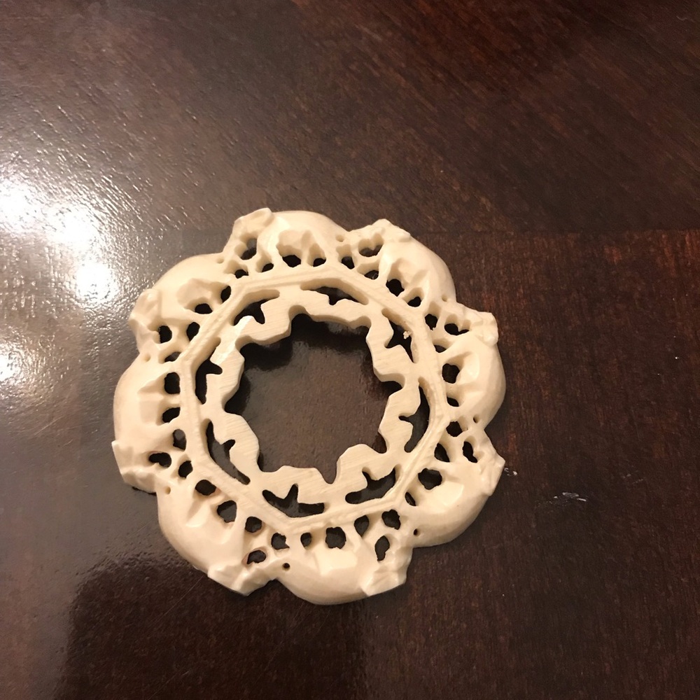 Intricate Cream Decorative Elephants Pendant
